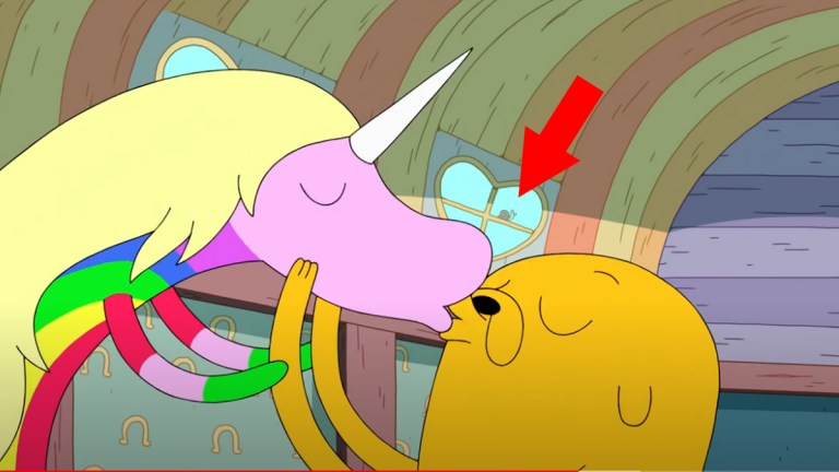 Jake the Dog kissing a unicorn in Cartoon Network cartoon Adventure Time